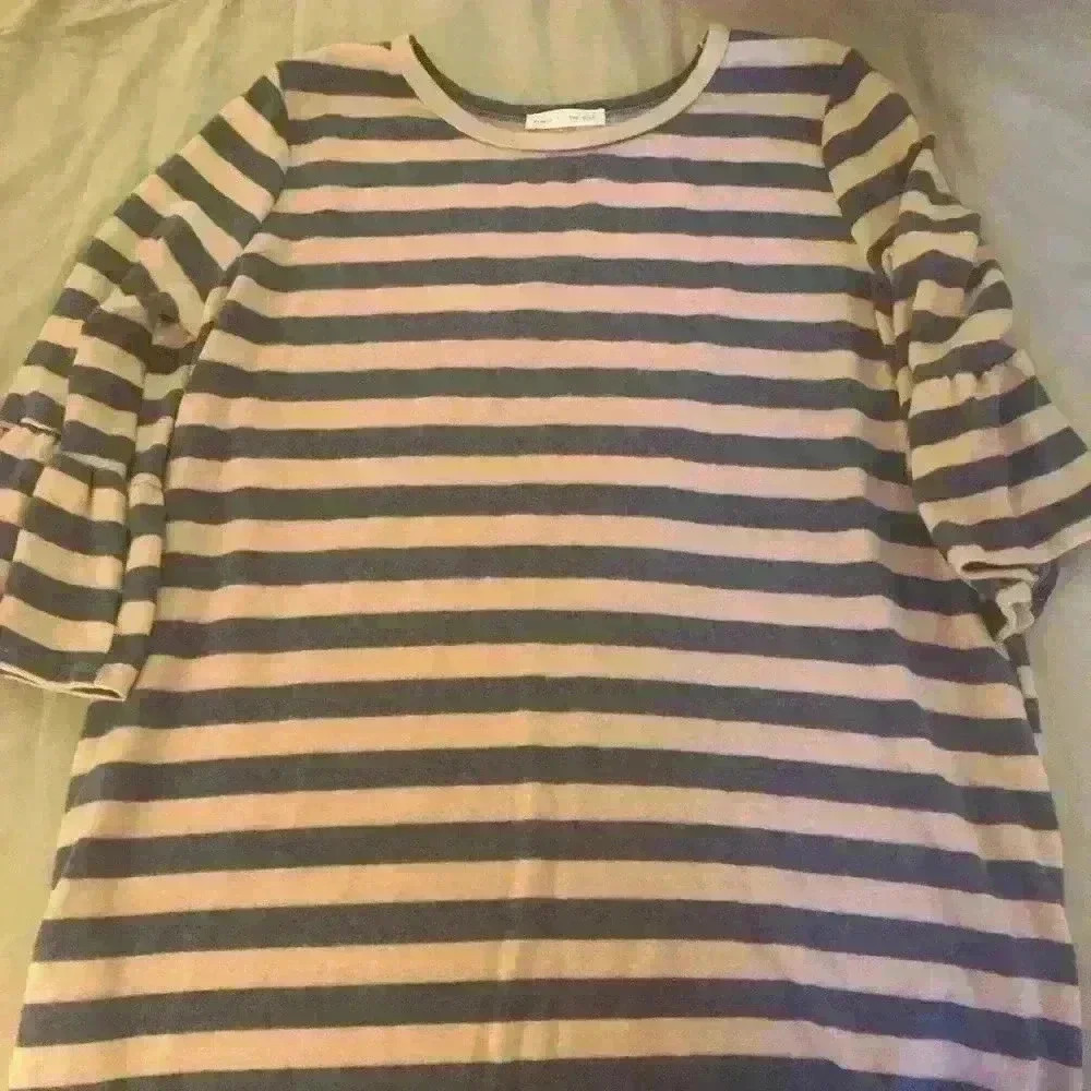 Bell sleeved top